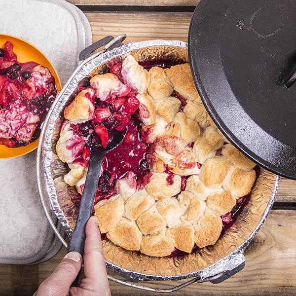 This Dutch Oven Three BerryCcobbler is easy at the campsite because it uses refrigerated biscuit dough.