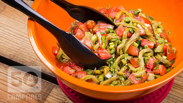 Prickly pear cactus salad is fresh and bright with tomatoes, nopales, and lots of cilantro, plus lemon juice.