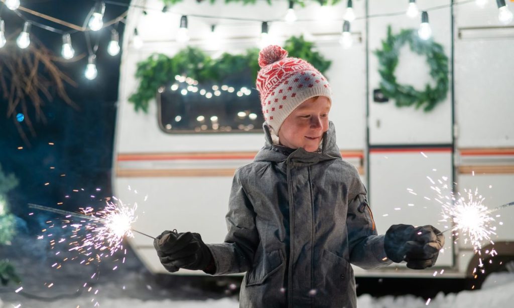 Cute Boy Playing With Sparkler Outdoors Cute Boy Playing With Sparkler Outdoors