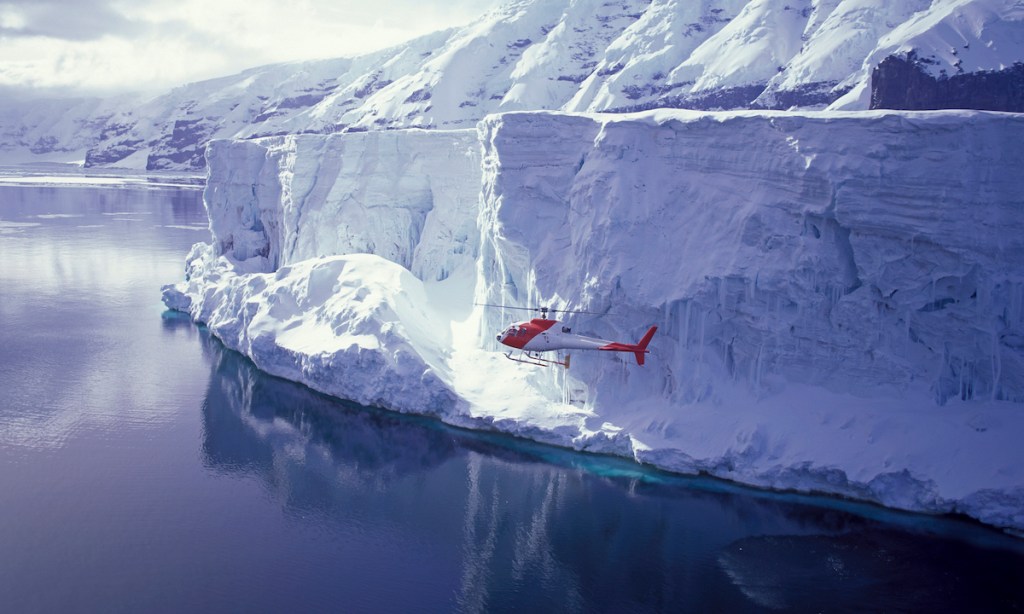 Balleny islands Antarctica helicopter ice snow cliffs mountains ruggard