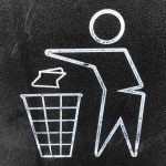 man throwing garbage away