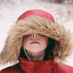 child wearing winter parka