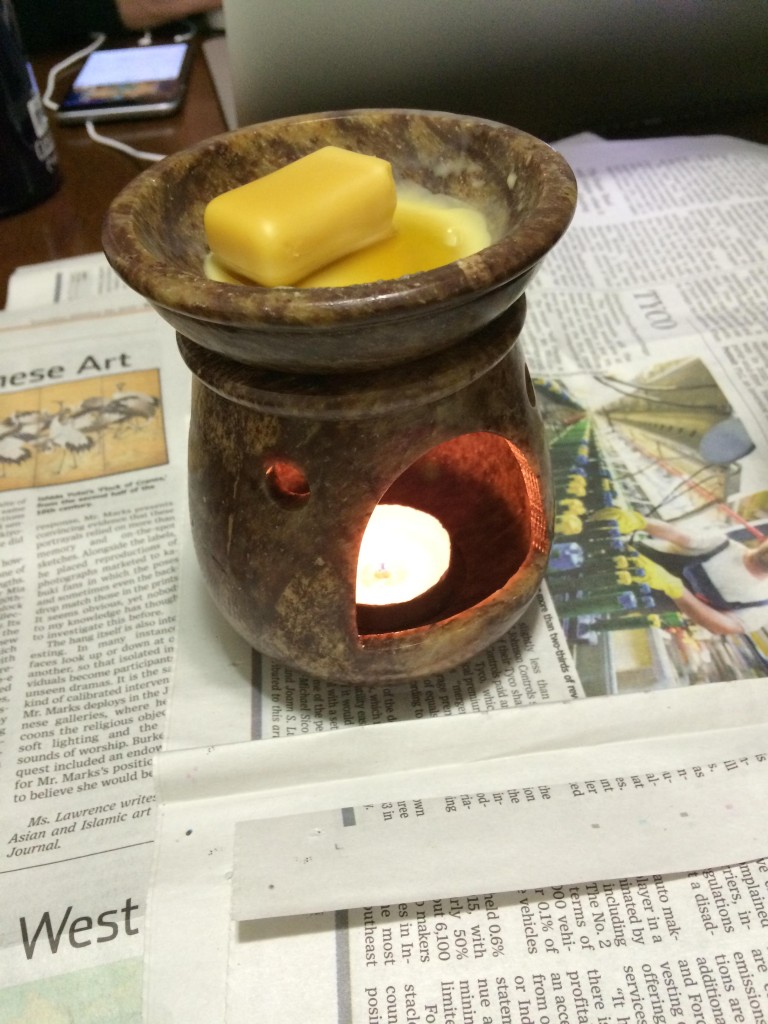 I melted the cosmetic grade beeswax with one of those scented oil lamps, and a little help from the heat gun because I'm impatient. 
