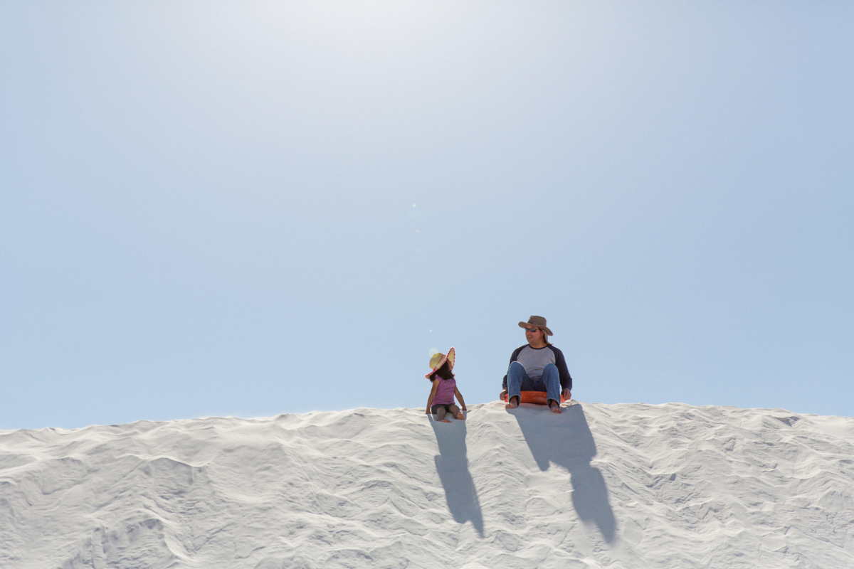 sleds in white sands