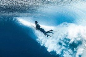 pictures of surfers from underwater