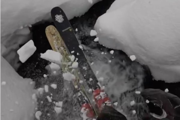 skier frozen waterfall