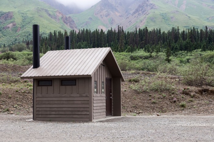 hiker carrying barrel